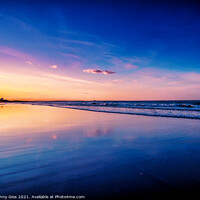 Buy canvas prints of Bamburgh Beach Sunset by Jonny Gios