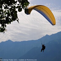 Buy canvas prints of A person flying through the air on top of a mounta by PhotOvation-Akshay Thaker