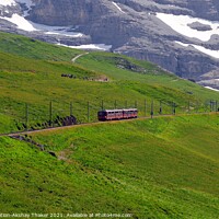 Buy canvas prints of The famous tourist train grazing on a lush green hillside by PhotOvation-Akshay Thaker