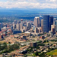 Buy canvas prints of Aerial view of city of Calgary with Rocky Mountains in the background. by PhotOvation-Akshay Thaker