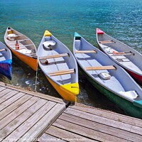 Buy canvas prints of Colorful boats sitting near a wooden dock over some water by PhotOvation-Akshay Thaker