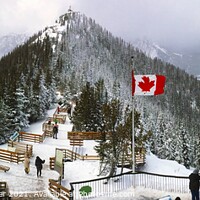 Buy canvas prints of A group of people standing on top of a snow covered Sulphur Mountain in Banff National Park by PhotOvation-Akshay Thaker