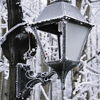 Buy canvas prints of An Abstract of Lamp post with a frost and ice on a freezing winter day. by PhotOvation-Akshay Thaker