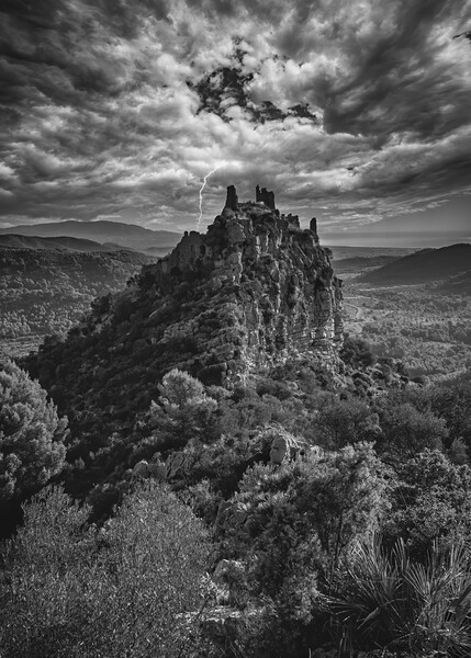 A castle on the mountain under the storm in black and white Picture Board by Vicen Photo