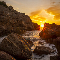 Buy canvas prints of Sunrise between the rocks in a cove of La Renega, Oropesa by Vicen Photo