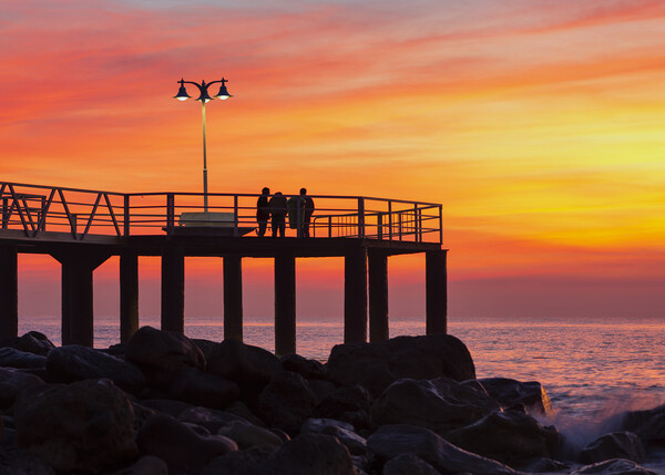 Photograph with a reddish sunrise at sea Picture Board by Vicen Photo