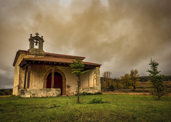 Photograph with a lonely hermitage in Soria under a cloudy sky Picture Board by Vicen Photo