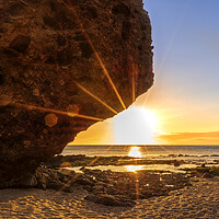 Buy canvas prints of Photography with the sunrise sun behind the rock of the beach of the dead by Vicen Photo