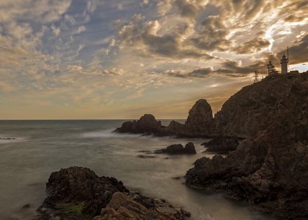 Photography with the lighthouse of cabo de gata in a calm sunset Picture Board by Vicen Photo