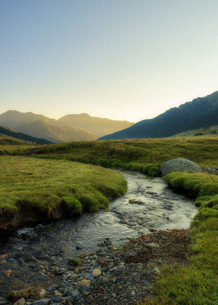 Photograph with a stream between the mountains at sunrise in the Aran Valley Picture Board by Vicen Photo