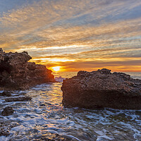 Buy canvas prints of Photography with a sunrise between the rocks in a seascape by Vicen Photo