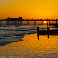 Buy canvas prints of Sun setting at Worthing Pier by Geoff Smith