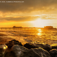 Buy canvas prints of Sunrise at Worthing Pier by Geoff Smith