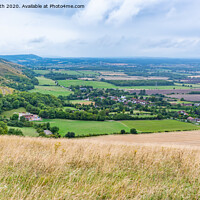 Buy canvas prints of South Downs with Fulking Village by Geoff Smith