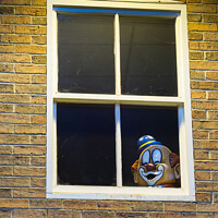 Buy canvas prints of Clowns head at window by Allan Bell