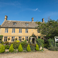 Buy canvas prints of The Dial House Hotel Bourton-on-the-Water. by Allan Bell