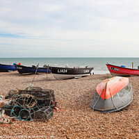 Buy canvas prints of Fishing Boats Drawn Up On Beach by Allan Bell