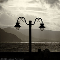 Buy canvas prints of Conwy Bay Silhouetted Lamp Post by Allan Bell