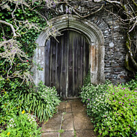 Buy canvas prints of Old Wood Door in Stone Wall by Allan Bell