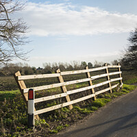 Buy canvas prints of Leaning Fence by Allan Bell