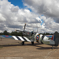 Buy canvas prints of Spitfire with D-Day markings by Allan Bell