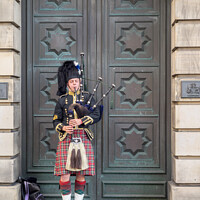Buy canvas prints of Bagpiper by Jeff Whyte