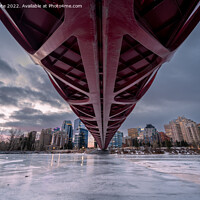 Buy canvas prints of Peace Bridge over frozen Bow River by Jeff Whyte