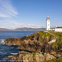 Buy canvas prints of "Guiding Light of Fanad: A Timeless Beacon" by KEN CARNWATH