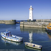 Buy canvas prints of "The Serene Beauty of Donaghadee Lighthouse" by KEN CARNWATH