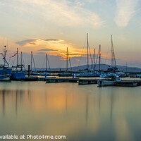 Buy canvas prints of Serene Sunset Reflections at Lough Swilly Marina by KEN CARNWATH