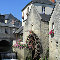 Buy canvas prints of Picturesque Waterwheel, Bayeux, France by Imladris 