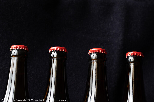 A row of red top beer bottles Picture Board by Imladris 