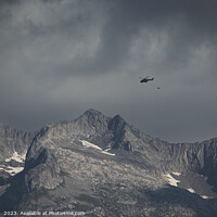 Buy canvas prints of Moody Swiss Mountain with Helicopter by Imladris 