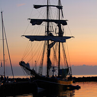 Buy canvas prints of Silhouetted Sunset Tall Ship by Imladris 