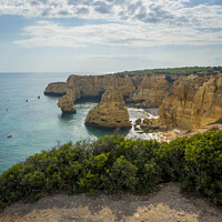 Buy canvas prints of View on cliffs on the Algarve beach in Ponta da Piedade in Portugal. by Kristof Bellens