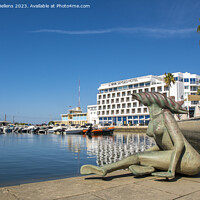Buy canvas prints of View on the Eva Senses Hotel and Sereia statue at the Marina district in Faro, Portugal by Kristof Bellens