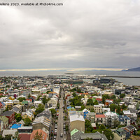 Buy canvas prints of Reykjavik, Iceland, skyline and cityscape with view over houses and skolavordustigur. Aerial. by Kristof Bellens