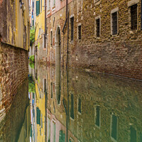 Buy canvas prints of Vertical shot of colorful canal houses in venice by Kristof Bellens