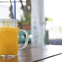 Buy canvas prints of Horizontal shot of a jar of homemade orange juice by Kristof Bellens