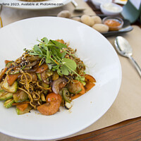 Buy canvas prints of Plate with vegan asian food. Wok noodles with vegetables by Kristof Bellens