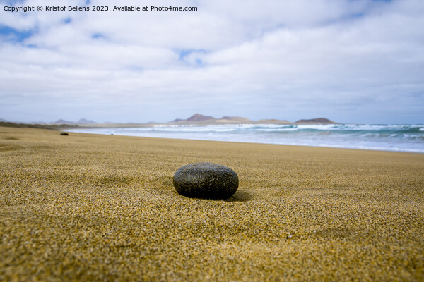 Empty beach with black stone in the foreground Picture Board by Kristof Bellens