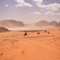 Buy canvas prints of Vertical desert off road track leading into the mountains of Wadi Rum. by Kristof Bellens