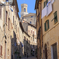 Buy canvas prints of Walking up to the Town Hall - Volterra by Laszlo Konya