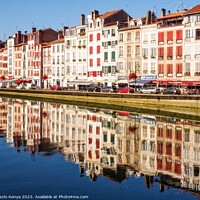 Buy canvas prints of Reflections in the Nive River - Bayonne by Laszlo Konya