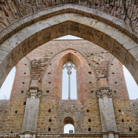 Buy canvas prints of Arch in the Ruined Abbey - San Galgano by Laszlo Konya