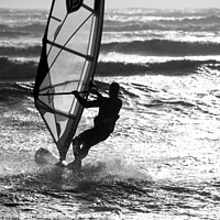 Buy canvas prints of Wind surfer heads out to sea by Paul Lawrenson