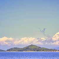 Buy canvas prints of island with a clear blue sky background by John Lusikooy