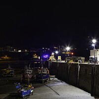 Buy canvas prints of Tenby harbour after dark by Darren Evans