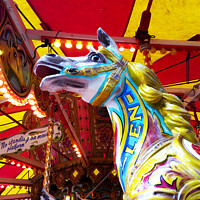 Buy canvas prints of Fairground carousel by Cliff Kinch