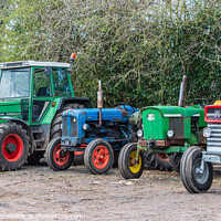 Buy canvas prints of Collection of old tractors by Cliff Kinch